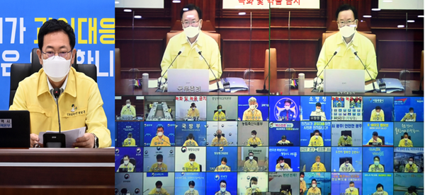 ▲사진설명 = 박남춘 인천시장이 29일 시청 재난상황실에서 국무총리 주재로 열린 '코로나19 중앙재난안전대책본부 영상회의'에 앞서 관계자들과 방역 대책 등을 논의하고 있다. 